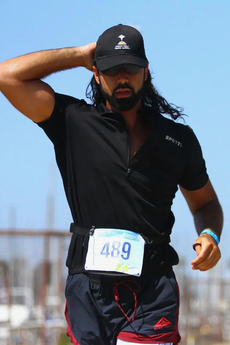 Justin competing in a triathlon